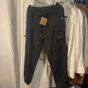 Black Burberry sweats with 4 pockets.